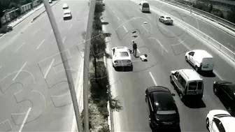 A Man Crosses The Highway