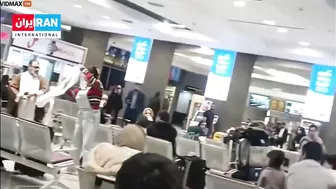 An Iranian Woman Removes The Headscarf From A Mullah's Head
