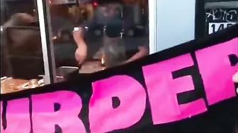 A Local Chef Sets Up Shop In A Window Before A Vegan Protest