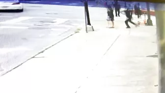 Black Man Knocks Down White Woman For No Reason