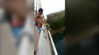 Brazilian Jumps Off Bridge