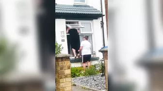 British Woman Trapped Outside Window