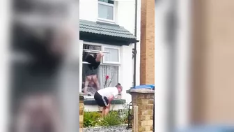 British Woman Trapped Outside Window