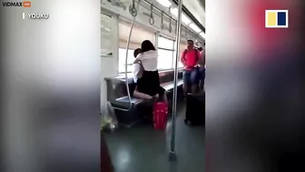 Chinese Woman Loses Consciousness And Jumps Towards Male Passenger On Subway