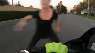 Crazy Karen Tries To Stop A Motorcycle With Her Feet