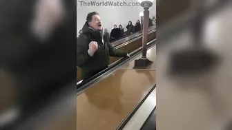 Drunk Russian Stops Escalator