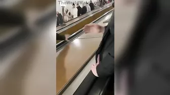 Drunk Russian Stops Escalator