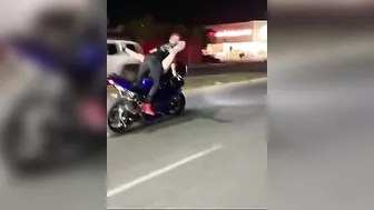 Woman On Motorcycle Insults Police