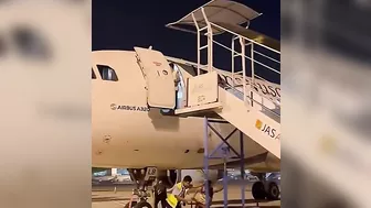 Ground Crew Dismantling Stairs