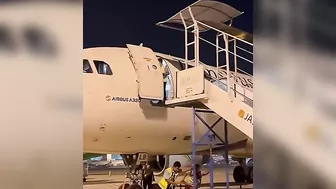 Ground Crew Dismantling Stairs