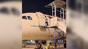 Ground Crew Dismantling Stairs