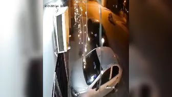 Homeless Man Crossing The Street With All His Belongings