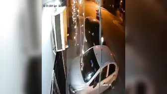 Homeless Man Crossing The Street With All His Belongings