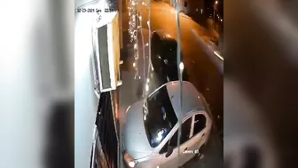 Homeless Man Crossing The Street With All His Belongings