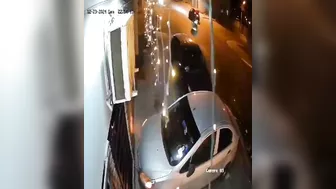 Homeless Man Crossing The Street With All His Belongings