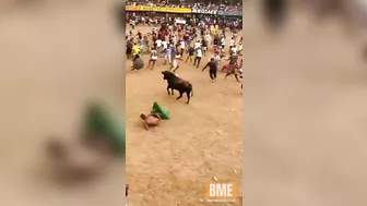 Idiot Trying To Headbutt A Charging Bull