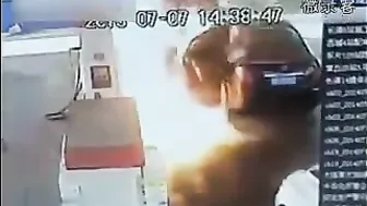Idiot Gets Burned When He Sprays Gas Station Attendant With Oil