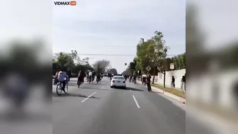 Man Drives Mercedes Through Crowd Of Punks Blocking Street