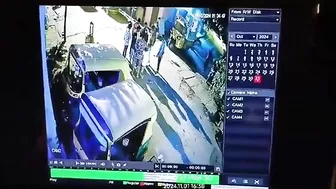 Man Sitting On A Box Of Burning Fireworks