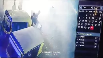 Man Sitting On A Box Of Burning Fireworks