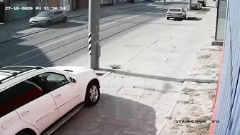 Man Jumps Onto Car Hood To Fix Dent