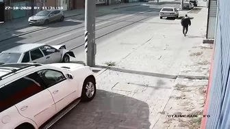 Man Jumps Onto Car Hood To Fix Dent