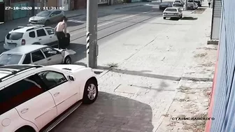 Man Jumps Onto Car Hood To Fix Dent