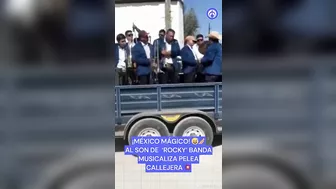 Mexican Band Plays Rocky In Street Fight