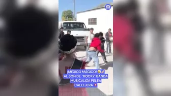 Mexican Band Plays Rocky In Street Fight