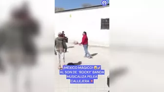 Mexican Band Plays Rocky In Street Fight