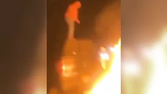Idiot Jumps Into A Burning Bonfire And Burns Himself