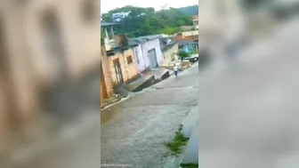 Part Of A Building Fell Onto A Car