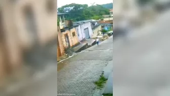 Part Of A Building Fell Onto A Car