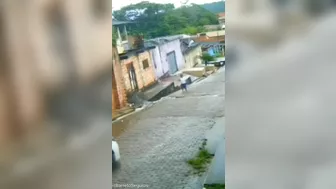 Part Of A Building Fell Onto A Car