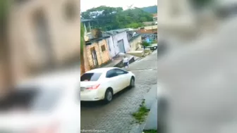 Part Of A Building Fell Onto A Car