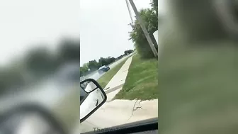 Showing Off His Car In A Mustang GT