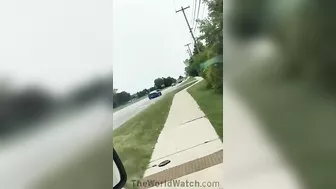 Showing Off His Car In A Mustang GT
