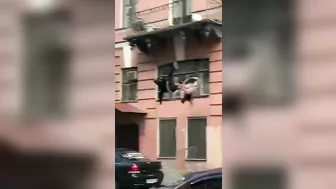 Toxic Couple Quarrels From Third Floor Balcony Onto Sidewalk