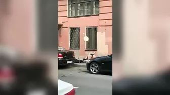 Toxic Couple Quarrels From Third Floor Balcony Onto Sidewalk