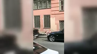 Toxic Couple Quarrels From Third Floor Balcony Onto Sidewalk
