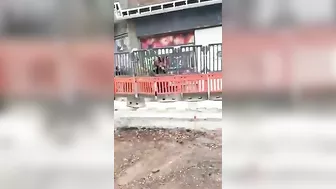 Madman Tries To Fight Construction Worker