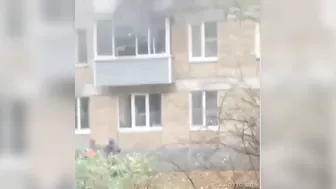 Woman Jumps From Burning Building