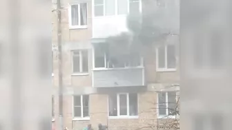 Woman Jumps From Burning Building