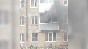 Woman Jumps From Burning Building