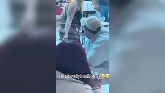 A Woman Walks Her Dog At An Atlanta Mall