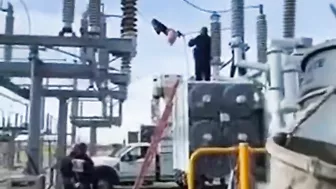 Woman Climbs On Transformer At Substation