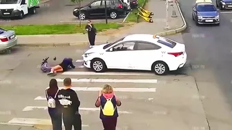 Young Scooter Girl Has Not Yet Learned The Traffic Rules