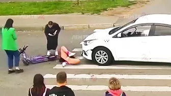 Young Scooter Girl Has Not Yet Learned The Traffic Rules