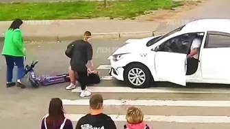 Young Scooter Girl Has Not Yet Learned The Traffic Rules