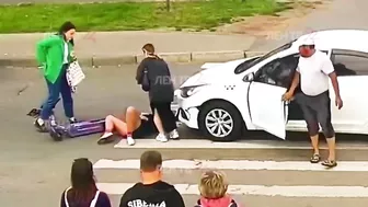 Young Scooter Girl Has Not Yet Learned The Traffic Rules